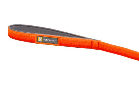 Orange dog leash with Ruffwear logo on a white background