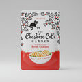 Cat food package with 'The Cheshire Cat's Garden' branding and a red background.