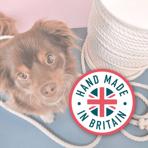 Dog lying on a rug with a 'Hand Made in Britain' logo in the foreground