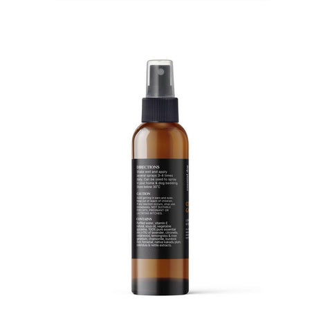 Brown spray bottle with black label on a white background