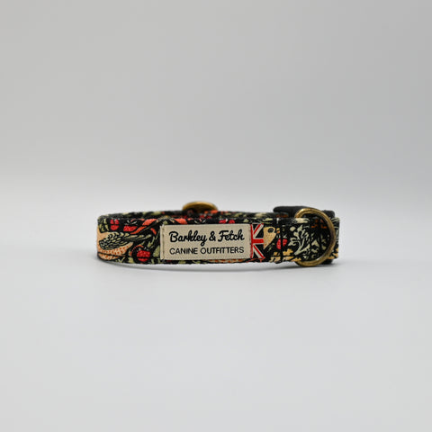 Dog collar with floral pattern and visible brand label on a white background