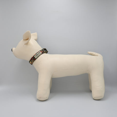 Beige dog-shaped mannequin with a collar on a Grey background