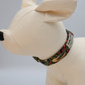 Dog collar with floral pattern on a mannequin dog head against a Grey background