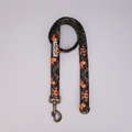 Dog leash with floral pattern on a Grey background