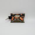 Poop Bag Holder with a flower patterned design on a neutral background.