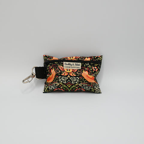Poop Bag Holder with a flower patterned design on a neutral background.