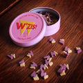 W'ZIS Lamp Post & Chips dog treats — close-up of blueberry-coloured grain-free treats — Sparkly Tails
