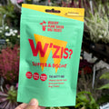 Dog with W'ZIS Slipper & Biscuit treats lifestyle shot — Sparkly Tails