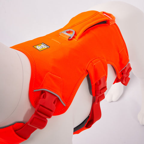 Mannequin wearing an Orange Ruffwear Web Master dog harness on a white background - top view