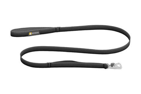 Black dog leash with a clip on a white background