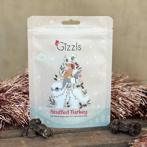 Gizzils Stuffed Turkey packaging with festive design on a wooden surface.