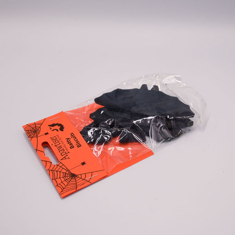 Black bat  biscuits in a clear plastic bag with an orange packaging label on a white background