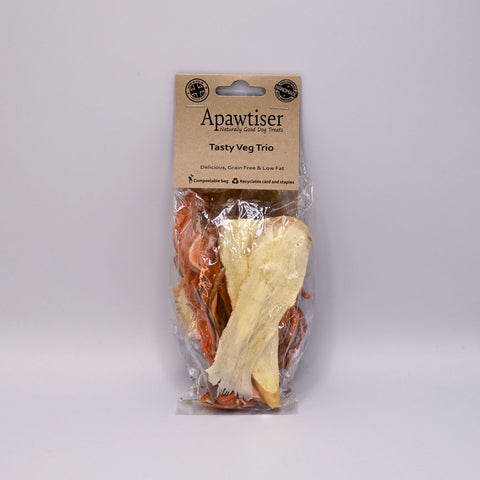 Dried vegetables dog treats with 'Apawtiser' branding on a Grey background