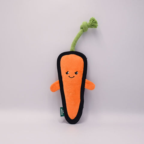 Carrot-shaped plush toy with a happy face on a light gray background