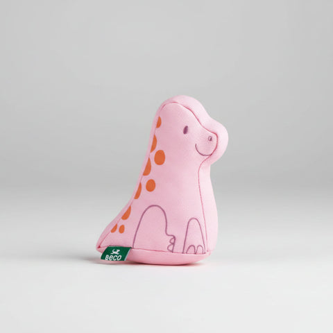 Pink dinosaur-shaped toy with orange spots on a white background