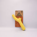 Yellow dog toy with Beco packaging on a light gray background.