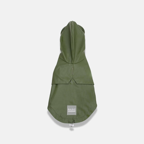 Green raincoat for dogs on a white background