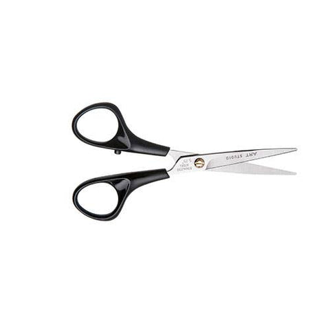 Black and silver Art Studio hair shears scissors on a plain white background.