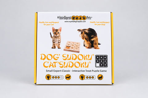 The product packaging box for 'Dog Sudoku Cats Sudoku' by My Intelligent Pets, featuring a white box with orange borders and illustrations of a cat and a dog next to a puzzle board.
