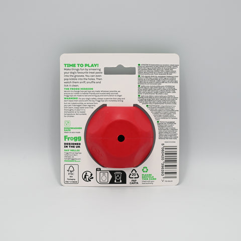 Red dog toy with a central hole and in original packaging.