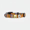 Dog collar with a patterned design and visible brand logo on a white background