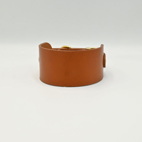 Brown leather bracelet on a light background