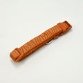 An orange woven dog collar with a repeating zebra pattern and matching orange plastic buckle, shown on a clean white background.